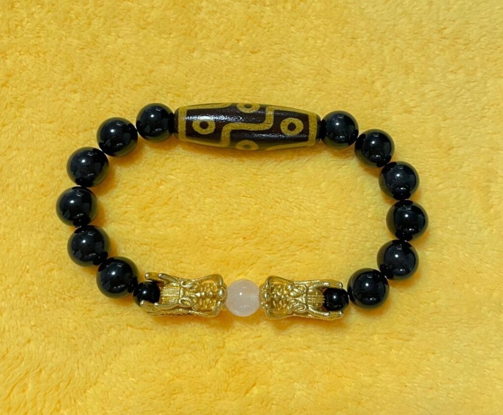 9-eye dzi with black tiger eye and phantom quartz bracelet